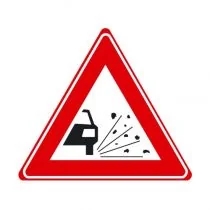 Verkeersbord J25 - Waarschuwing losliggende stenen